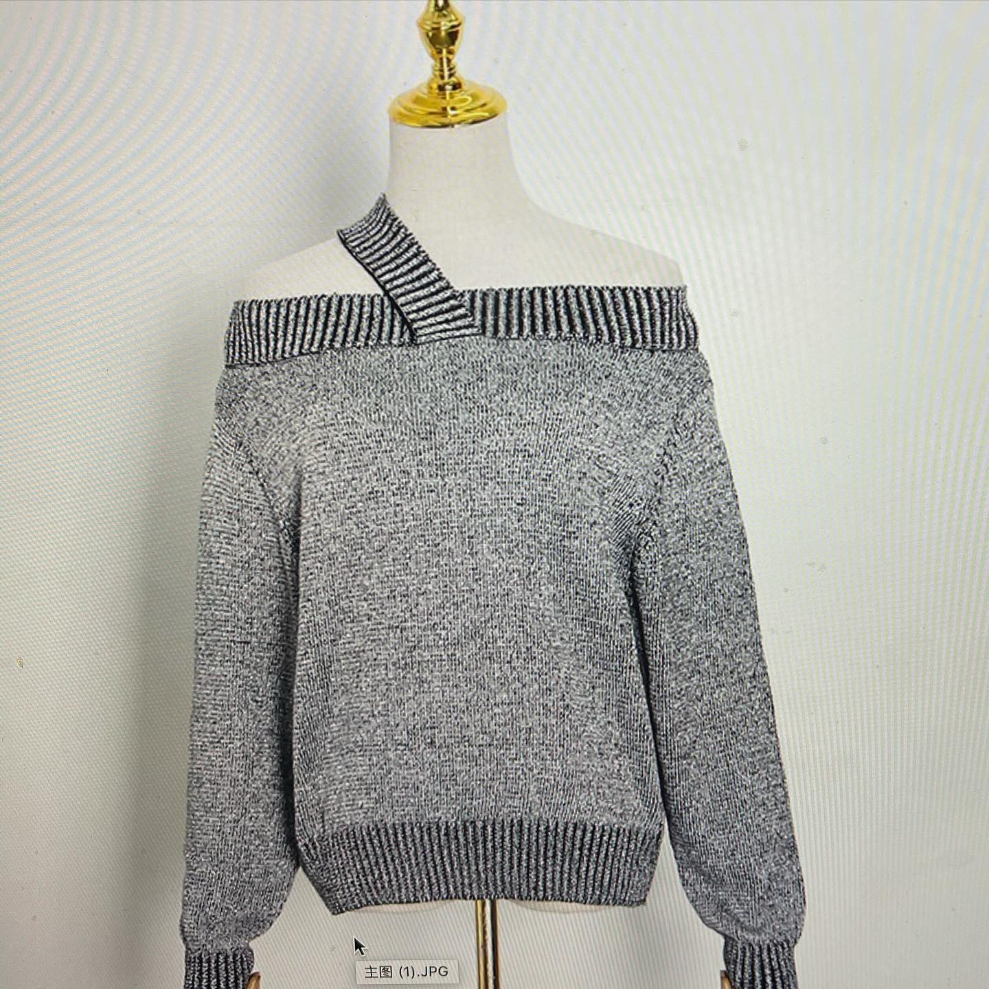 A grey sweater.